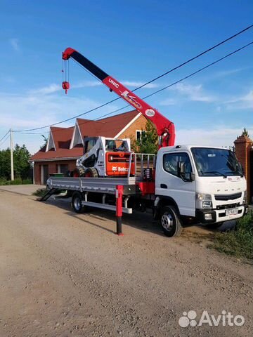 Услуги воровайки и фронтального погрузчика Bobcat Услуги воровайки и фронтального погрузчика Bobcat