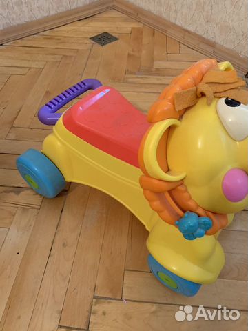 Каталка лев fisher price