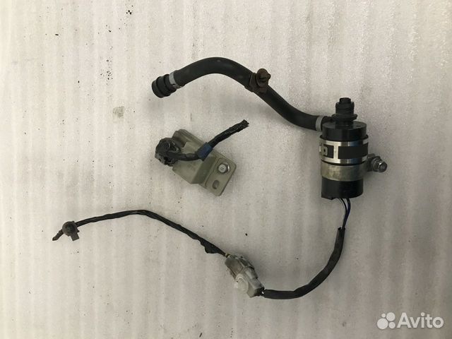 Насос омывателя фар Subaru Outback B13 рестайл Насос омывателя фар Subaru Outback B13 рестайл