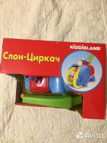 Музыкальная игрушка слон-циркач. Каталка