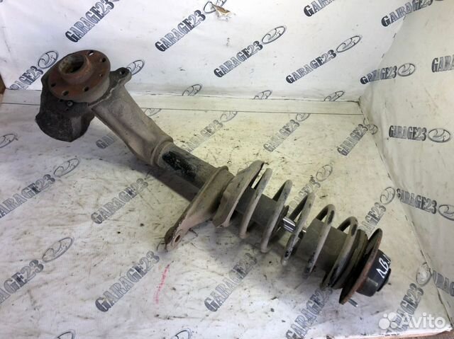 Стойка амортизатора левая Chevrolet Lanos в сборе