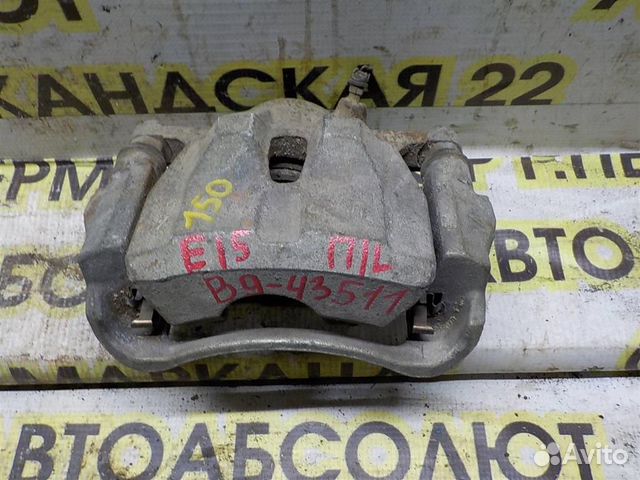 Суппорт передний левый Toyota Corolla (E150) 2006