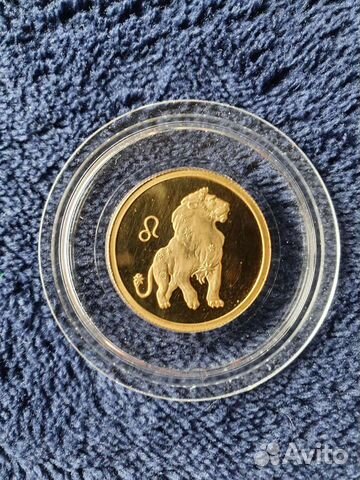 Золотая монета 50 р 