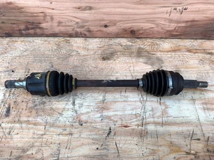 Приводной вал левый Mitsubishi Lancer 10 2.0