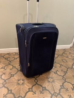 Чемодан на колесах samsonite
